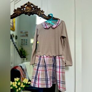 This is a beautiful dress one season worn by my daughter 🧒